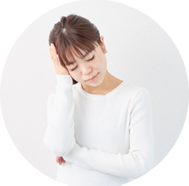 不調に悩む女性